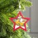 Christmas tree toy "Red Star with deer", from batteries, glow of warm white