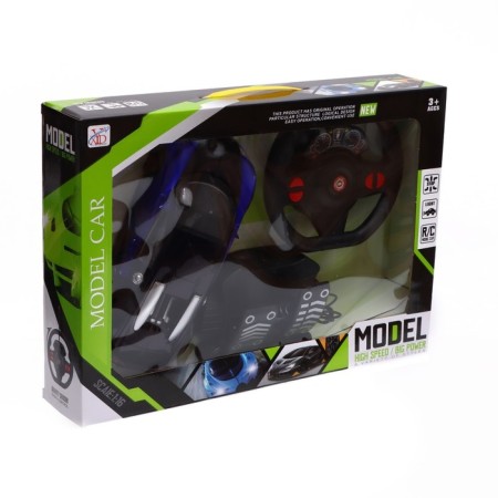 The radio -controlled "coupe" machine includes pedal and steering wheel, works on batteries, the color is blue-9