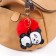 Fluffy on a ring with a carbine "Panda with a red pompom" d = 8 cm