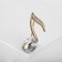 Brooch "Note" from the symphony, the color is white in gold