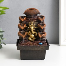 The desktop fountain from the Ganesh network at the cliff with a waterfall 18x12x12 cm