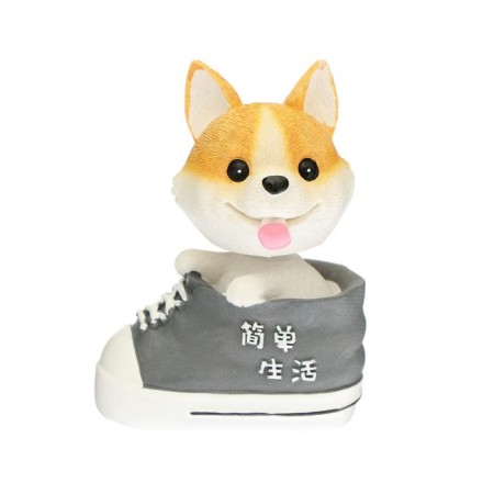 Dog on a car panel shocking his head, velsh-corn-1