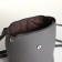 City backpack made of artificial leather with lightning, the color is gray