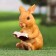 Garden figure "Bunny reads the book" 10x8x15cm
