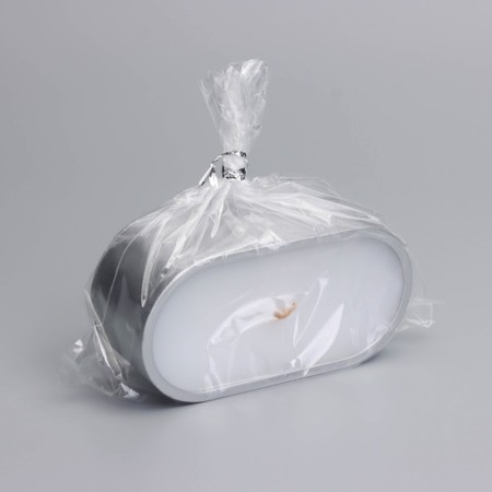 Candle in an oval candlestick of gypsum, 9.5x4.7x3cm, silver-4
