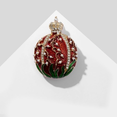 Brooch "Pomegranate" with a crown, black and white color in gold