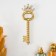 Panel interior polystone "twisted key with a crown" gold with a white patina 5.5x1x17 cm