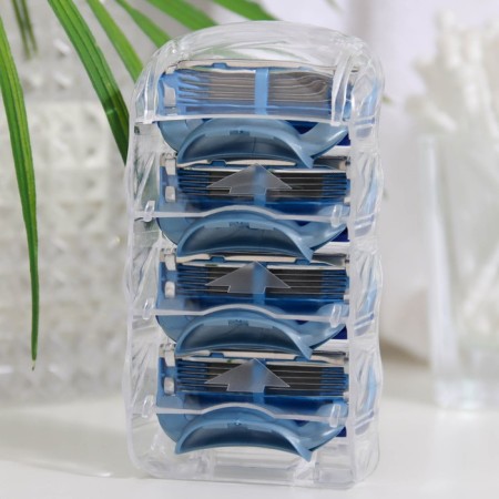 The machine is a razor and 12 interchangeable cassettes of blades, compatible with Gillette Fusion-4