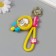 Trick rubber with a strap "Lollipop on a stick with a bow. Pyosik" 6.5x4.5x2 cm