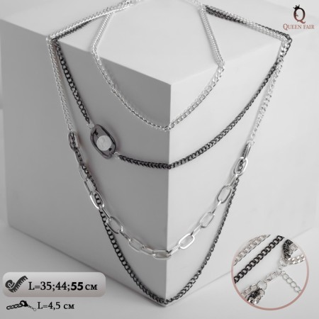 The beads "chain" are a square pearl in the cut, the color is black and white in silver, 53 cm