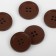 A set of buttons, 4 punctures, d = 23 mm, 5 pcs, a dark brown matte color