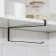 Holder for paper towels of a suspended share, 26 × 1.5 × 12 cm, black color