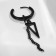 Piercing in the ear "Ring" Triangle with a chain, d = 15 mm, black color