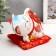 Pigger Ceramics "Cat Mani-Neko with coins on the rug" 10x12.5x7 cm