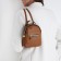 Women's backpack of artificial leather with lightning, 1 pocket, brown color