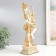 Polystone souvenir "Dancing deity with a musical instrument" with a white-gold 13x9x34 cm