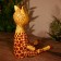 Souvenir "Girafic" hanging paws, wood 40 cm