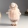 Interior doll "Baby in a fur vest and in a hat with a pompom" 27x9x12 cm