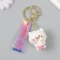 A keychain plastic, rubber with a carbine, a strap "Kitten with ice cream" 3.5x4.2 cm