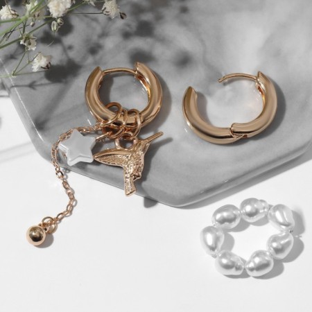 Earrings with the removable element "Transformer" bird, white color in gold-1