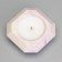 The candle "Square" in the candlestick with beveled corners is small, 9x3.5cm, marble with purple. stripes