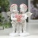Polystone souvenir "Angels in pink wreaths with heart from roses" 10x8.5x5.5 cm