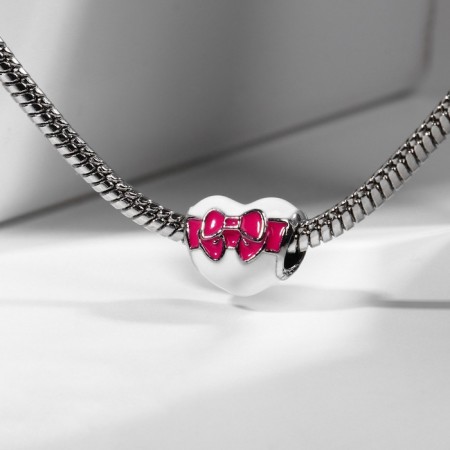Talisman "Heart" with a bow, white-pink color in black silver-1