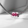 Talisman "Heart" with a bow, white-pink color in black silver