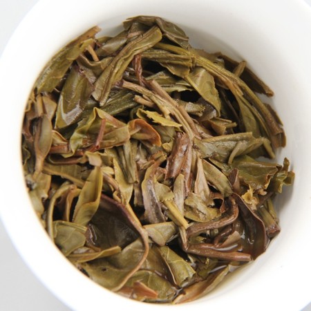 Chinese sustained green tea "Shen Puer Gu Shu. 8582", 250 g, 2012, Yunnan, brick-1