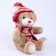 Soft toy "Little Friend", New Year's bear in a hat and scarf, pink color