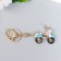 Browler Metal with carbine, enamel, rhinestones "Blue moped"