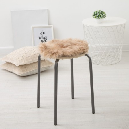 Sitting on a chair fur shares "fluff" ts.