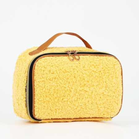 Cosmetic bag on lightning, with a lodge, yellow color