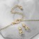 Set 2 objects: earrings, pendant “melting” Heart, black and white color in gold, 40 cm