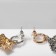 Earrings Metal "Eucky" melting, silver-golden color