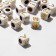 Acrylic bead "English letters" mix, cube 7 × 7 mm, set 10 g, white-golden color