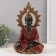Polystone souvenir "Buddha in red robes, with golden patterns" 17x11x28.5 cm
