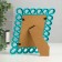 Photo frame plastic 10x15 cm "loops" blue 17.5x22 cm