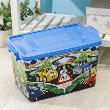 Storage container with a “machine lid”, 35 l, 51 × 31 × 28 cm, on wheels, dark blue color
