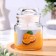 Candle in the bank Aromatic "Juicy Orange" 6x8.5cm