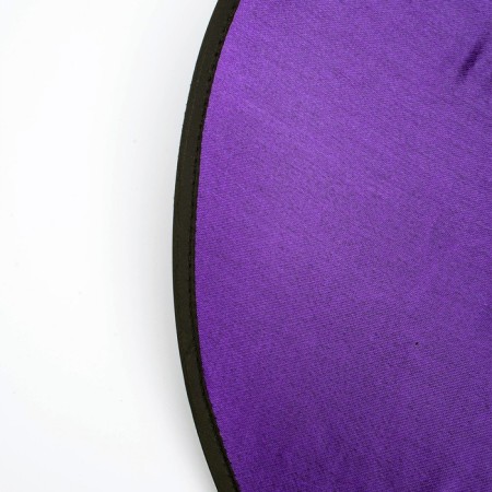 The carnival hat is “purple”, draped, with a bat, p. 56 - 58-7