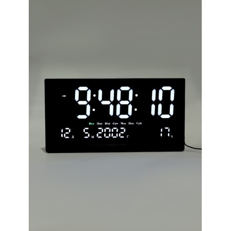 Electronic wall clock, calendar and thermometer, 47.5 x 25.3 cm, white numbers 10.8 x 5.3 cm 10766
