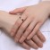 Ring Xuping glow, white color in gold, size 18