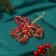 Christmas tree decoration "Lace butterfly" 10x12 cm, red overflow