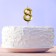 Candle for the cake, the number "8", gold.