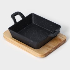 Cast iron pan “Night”, 18.5 × 12.5 × 5.2 cm, on a wooden stand