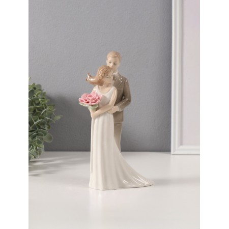 Souvenir Ceramics "The groom hugs the bride with the flower" 5x10.8x21 cm-1