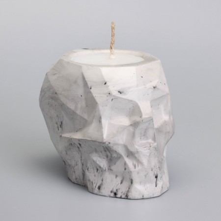 Candle "Skull" in a candlestick of gypsum with faces, 6x9x6.5cm, marble with black stripes-1