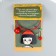 Acryl keychain on a cable with a bell "Baby in a red beret with a rose"