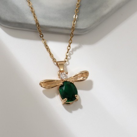 Piece "Beetle" green insert, green color in gold, 45 cm